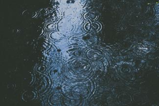 photo of body of water and droplets by Alex Dukhanov courtesy of Unsplash.